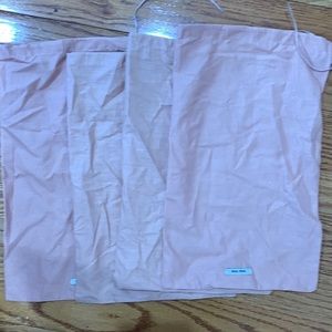4 Miu Miu dust bags